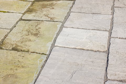 Patio sandstone paving before and after pressure washing restoration